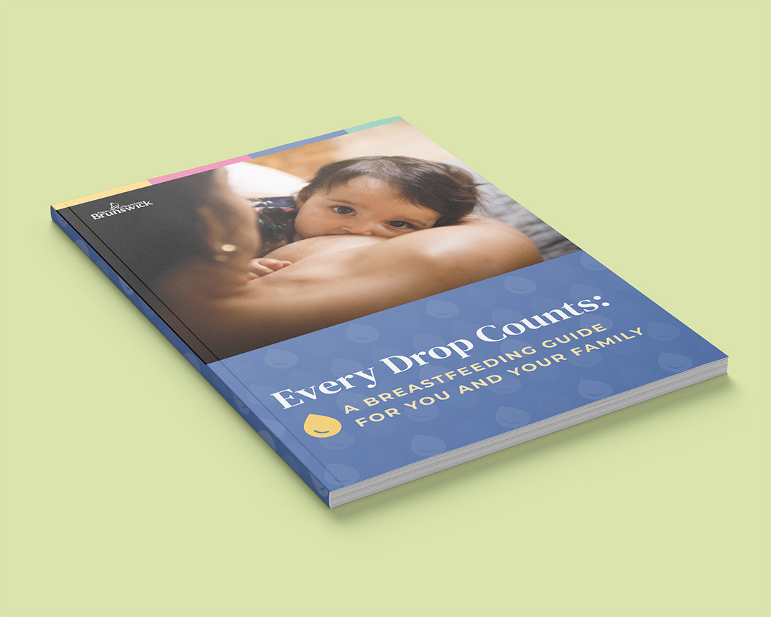 Cover of the redesigned breastfeeding guide booklet on a light blue background.